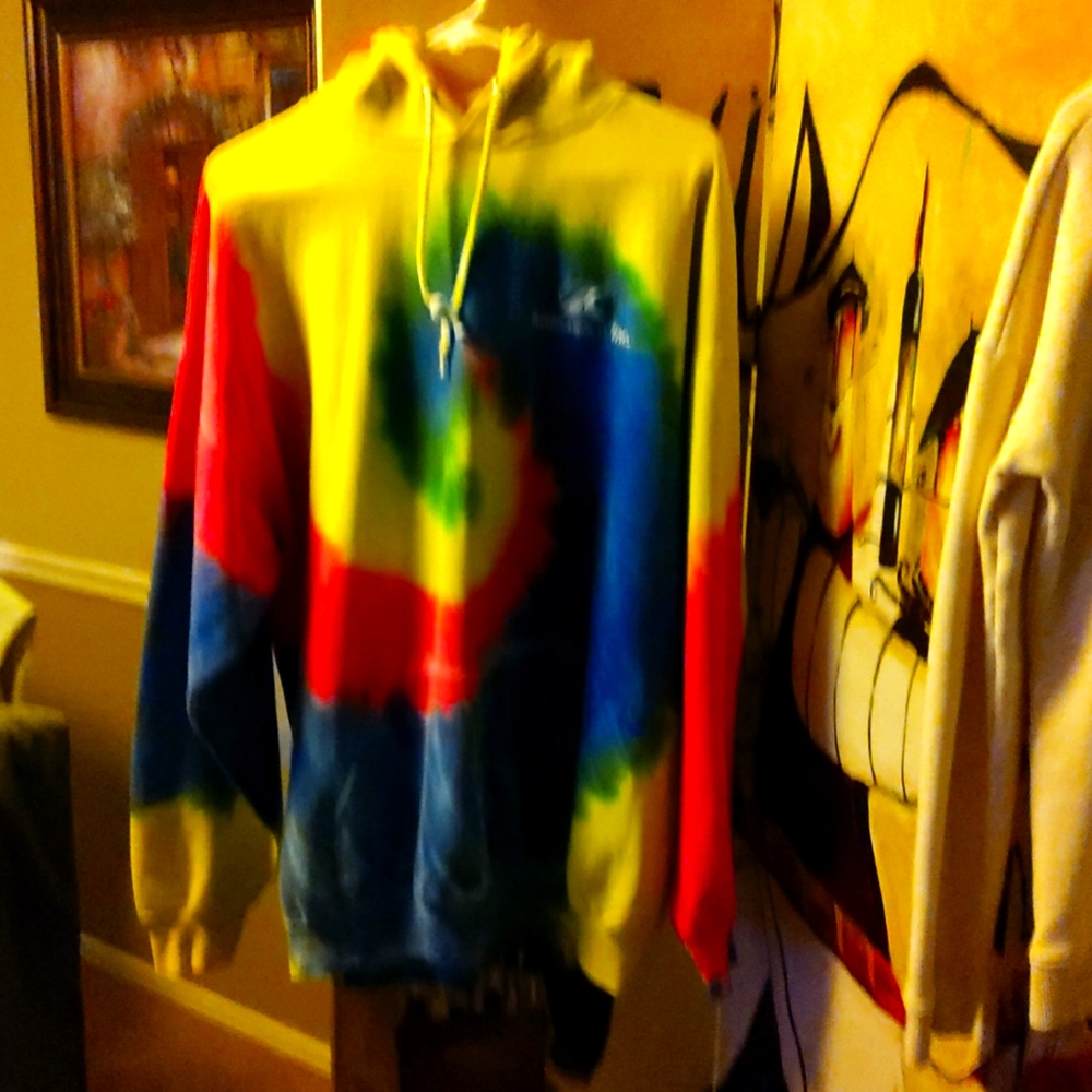 A tye dyed hoodie with vibrant colors